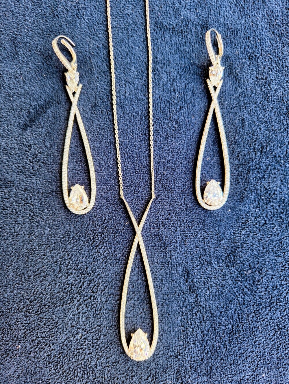 Silver And Rhinestone Teardrop Pendant Necklace And Earrings with White Stones